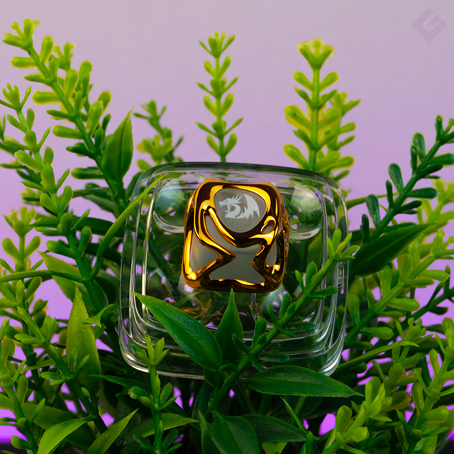 Keycap Redragon para una tecla, transparente con dorado